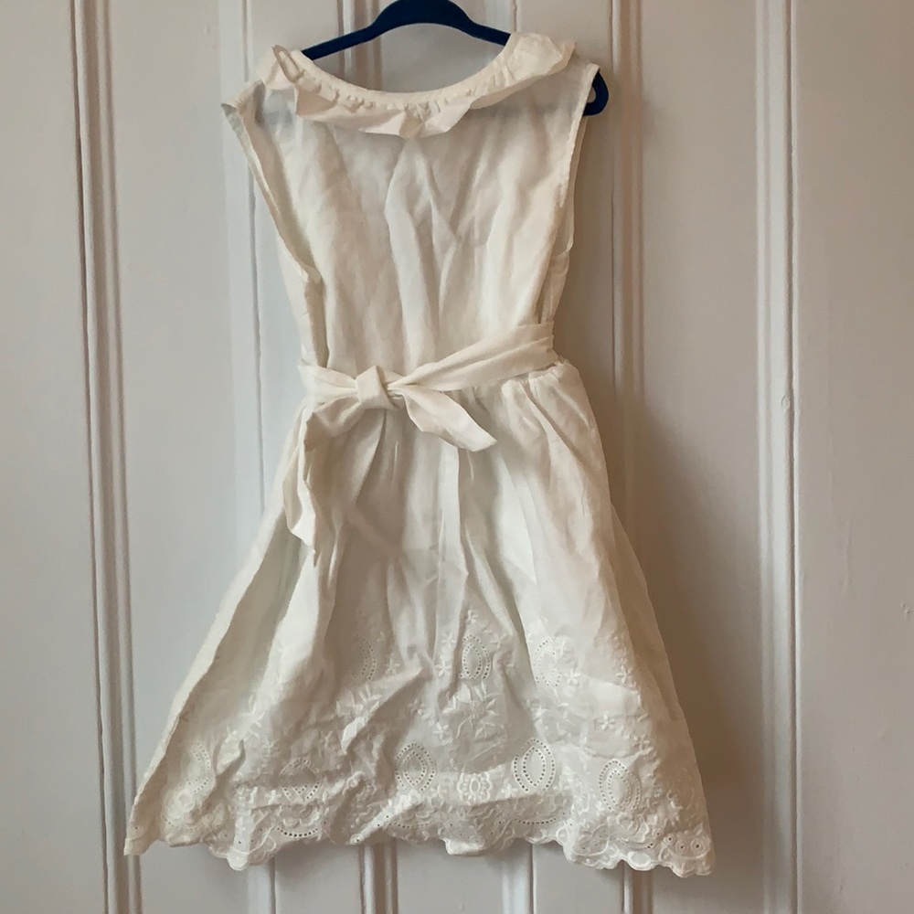 White cotton tie waist dress with eyelet border